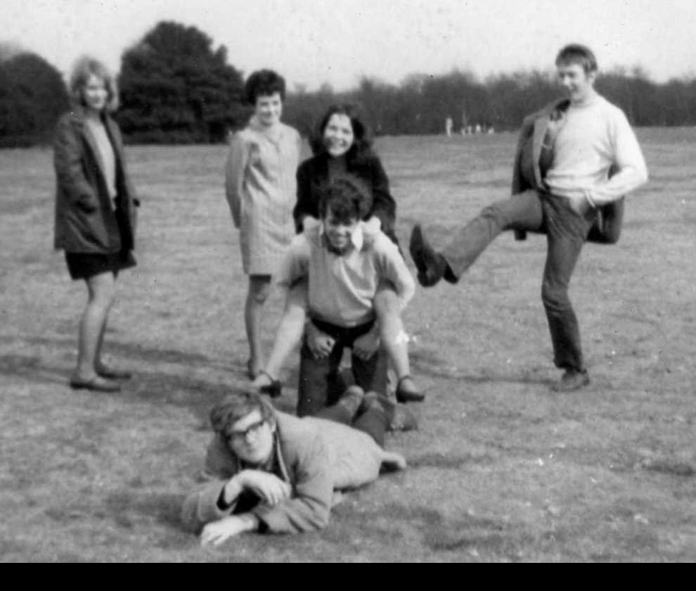 Easter 1968 in Sutton Park.  Left to right: Margaret, Janet, Ann (getting a piggy-back from me and a kick from Vince) and Nigel (the table-tennis wiz) in the foreground.  