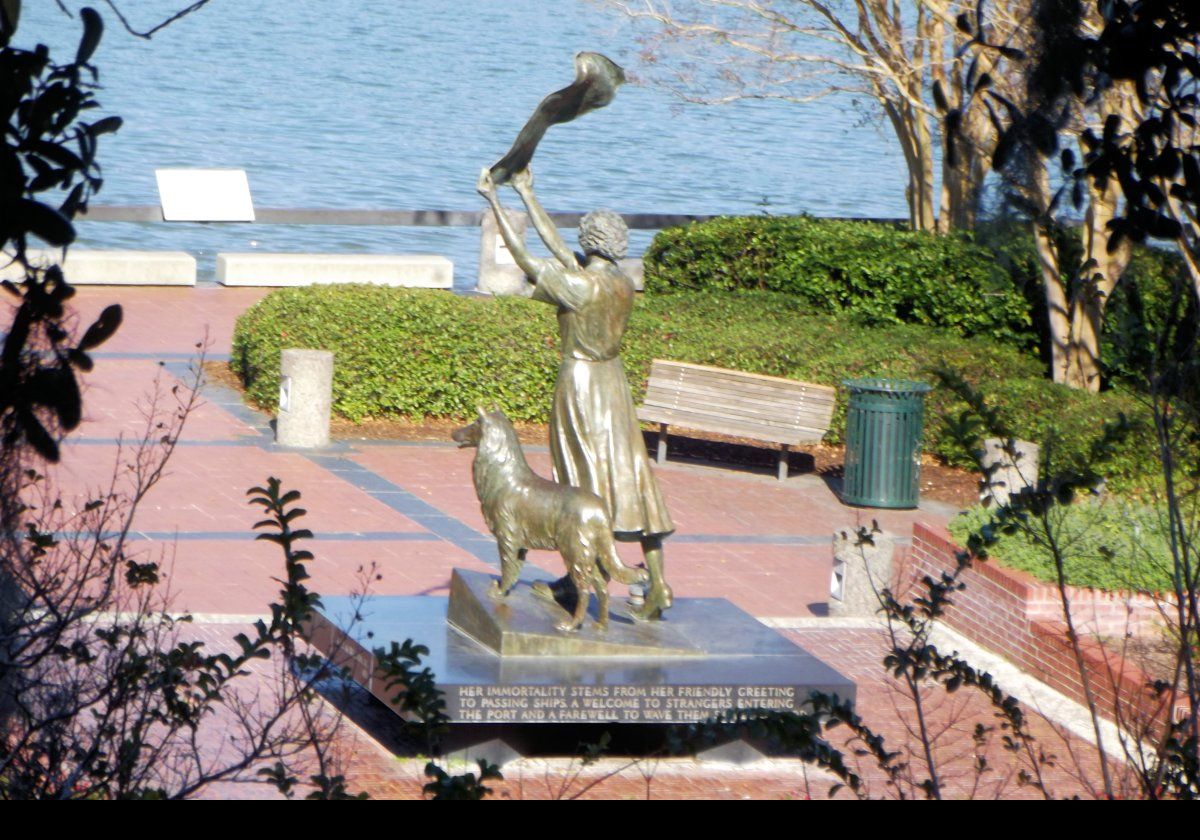 The statue of "The Waving Girl" by Felix de Weldon.  Her real name was Florence Martus.  For 44 years between 1887 and 1931, she waved a handkerchief during the day and a lantern at night to every ship entering or leaving the port of Savannah.  Click the image for a detailed account of her life.  