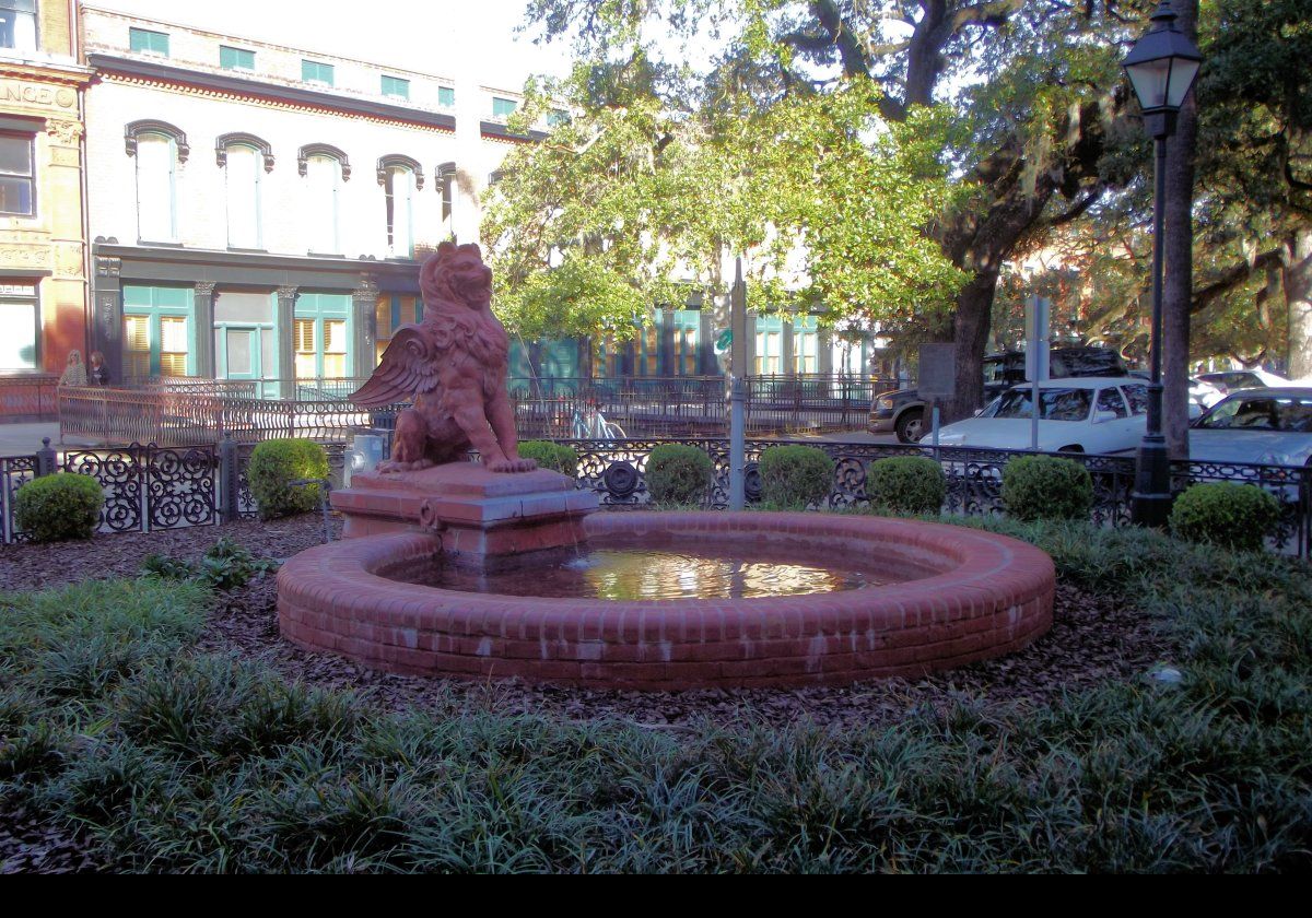 The winged lion, or gryphon, statue outside the Old Savannah Cotton Exchange .  It was destroyed by a car in 2008 and subsequently restored.  Wonderful!