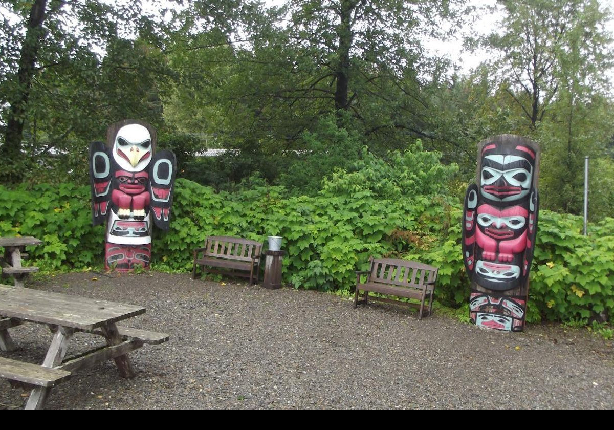 Heading north from Icy Strait Point, in the opposite direction to Hoonah, we find these two totems in a picnic area.  