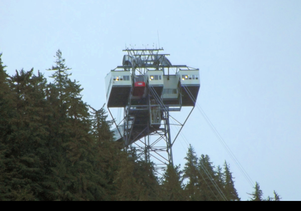 The Mount Roberts aerial tramway located just south of downtown Juneau has operated since 1996. Mount Roberts is 1,164 m (3,819 feet) tall, and the tram takes 6 minutes to ascend or descend. The two cabins are connected by a 2.4 km (7,875 foot) cable 35mm (1.4 ins) thick.  