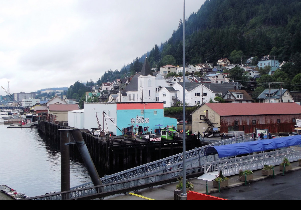 Preparing to get off the ship to make our very first steps on Alaskan soil in 2011!  The tower in the center of the picture is the First Lutheran Church of Ketchikan.