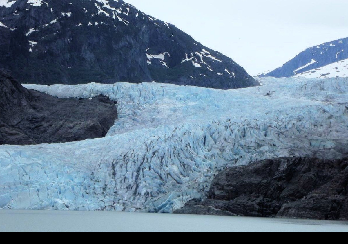 The glacier is about 21 km (13 miles) long from the Juneau Ice Field to Mendenhall Lake.