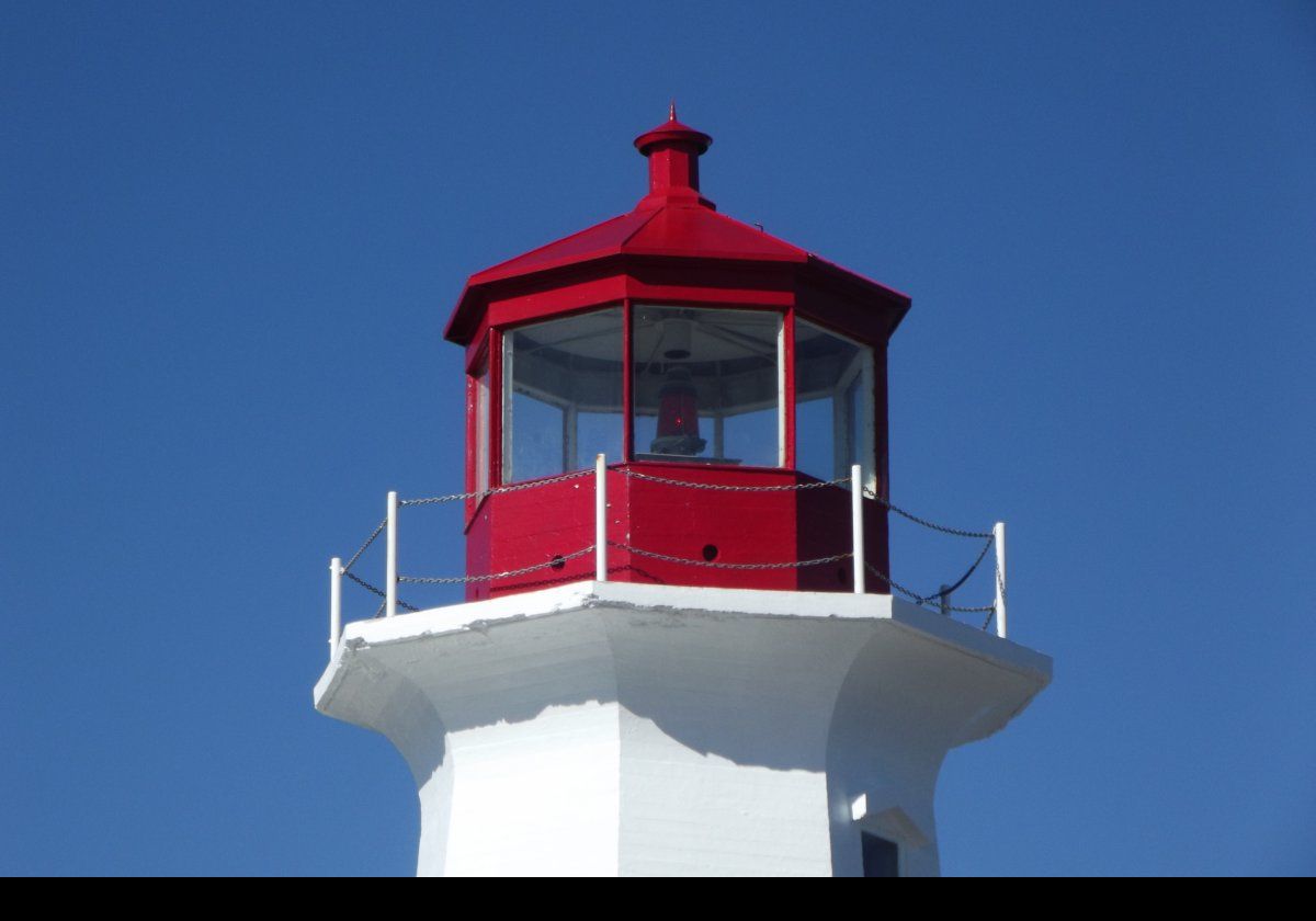 The light was, originally, red but went through a series of changes to white (when the new lighthouse was built), then to green in 1979, and back to red in 2007, which is what it now shows.  