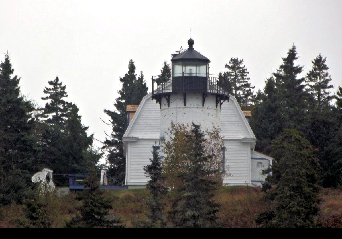 The light was built in 1839, comprising a keeper's house with an integral wooden tower for the light.  Despite the availability of Fresnel Lenses, due to cost they were not used in the US until 1841, so 13 inch reflectors were used in the Bear Island lighthouse.