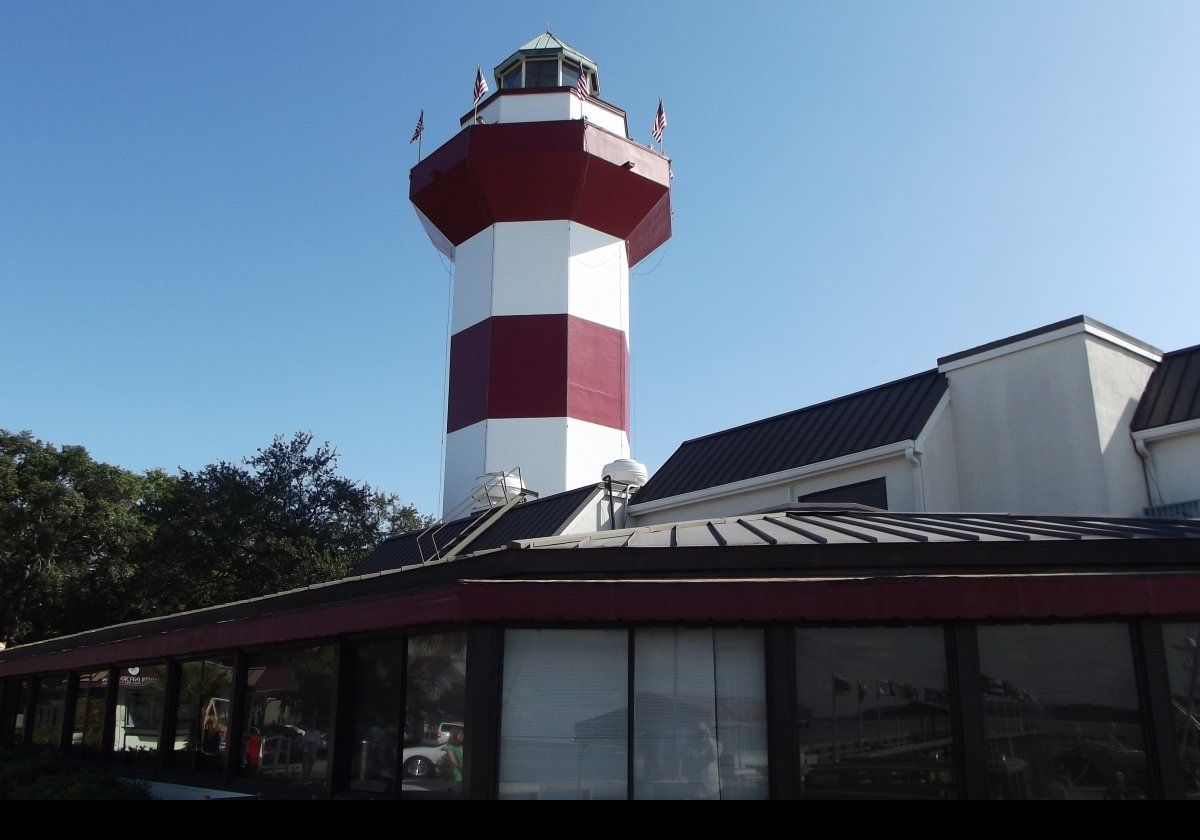 The lighthouse shows a white flashing light with a period of 2.5 seconds.  It is visible for up to 24 km (15 miles).  