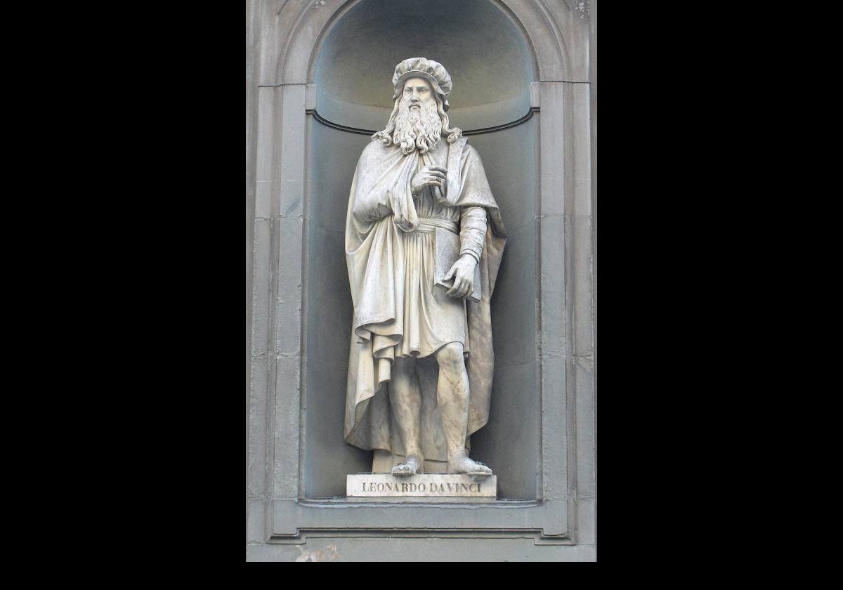 A statue of Leonardo da Vinci that stands outside the Uffizi Gallery.  