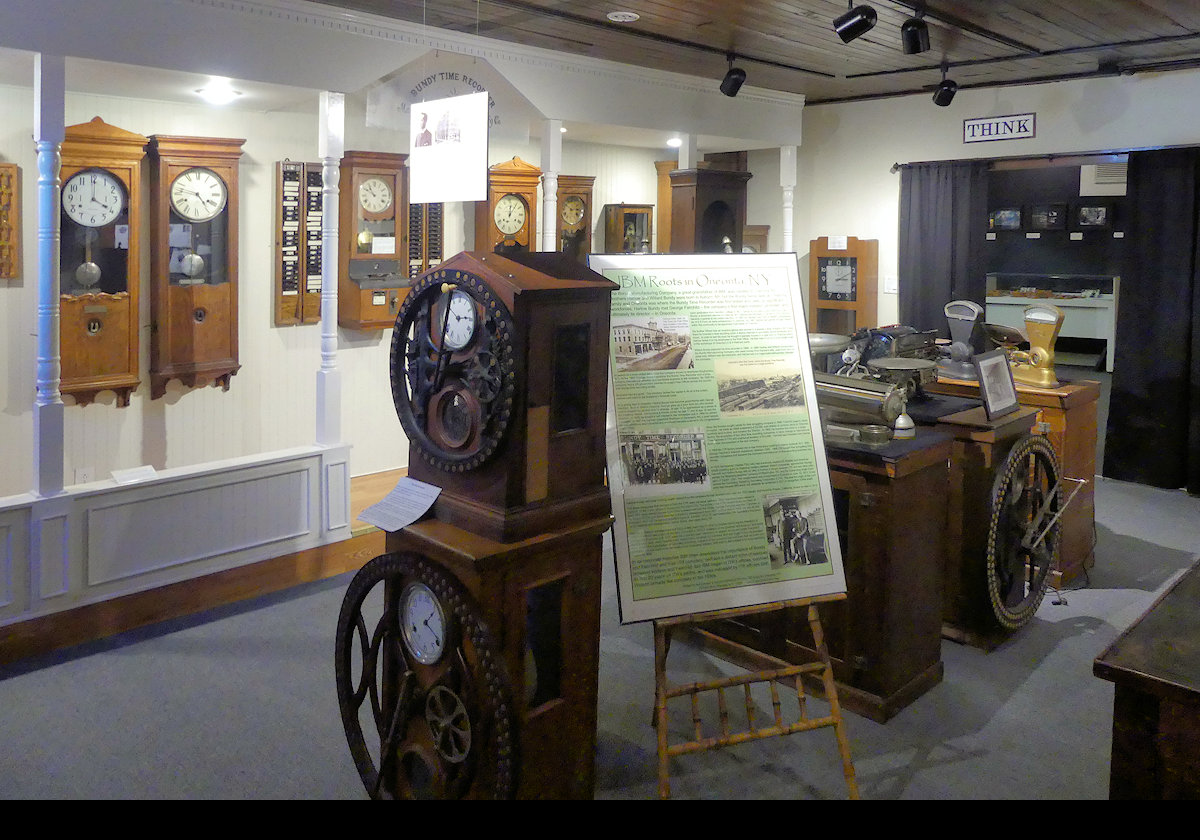 This is the recreation of the Bundy Company's 1893 World's Fair booth featuring an array of time clocks. 