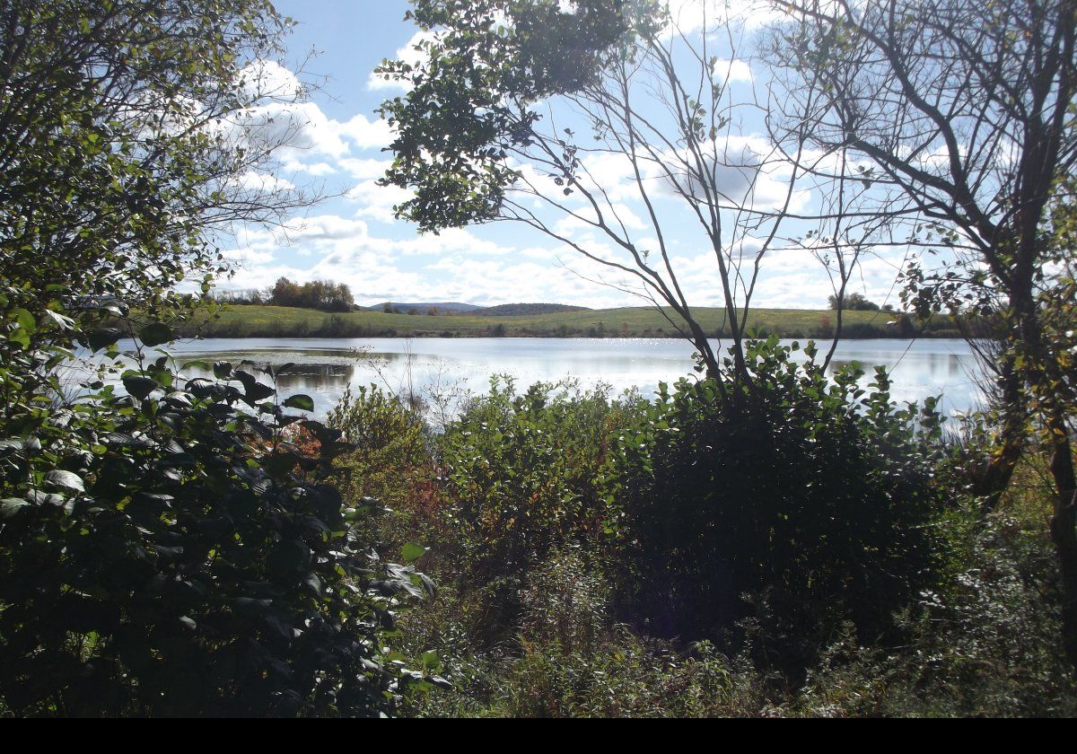 View across the lake in Spring time.  Click the image to see the same view in the Fall.