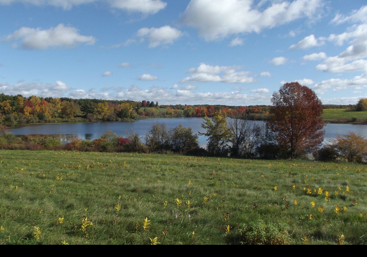 Another view across the lake in Spring time.  Click the image to see the same view in the Fall.