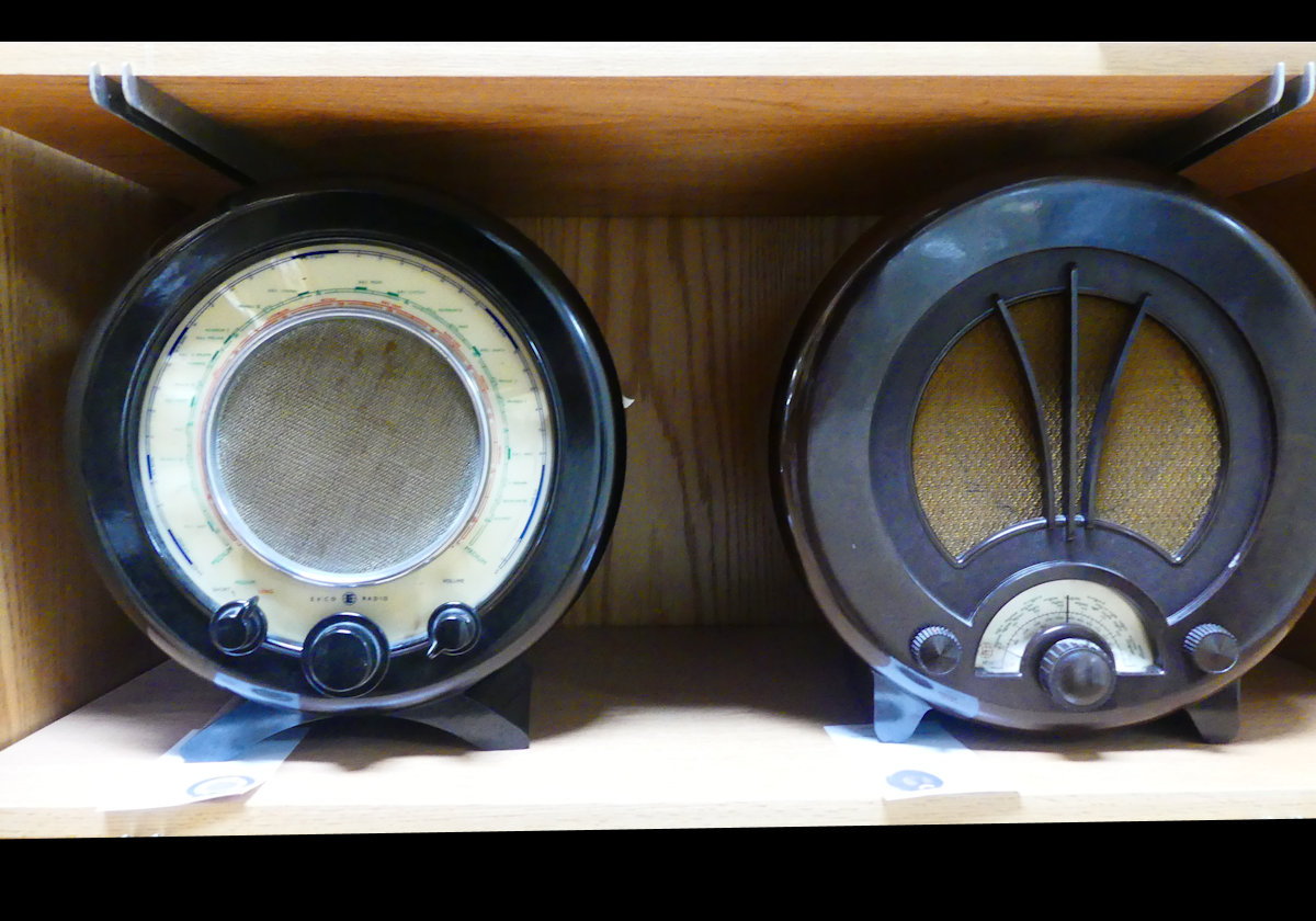 On the left, an Ekco model A22 multi-band radio made in the U.K. in 1945.       
On the right, an Ekco model AD75 AM & Long Wave radio made in the U.K. in 1940.