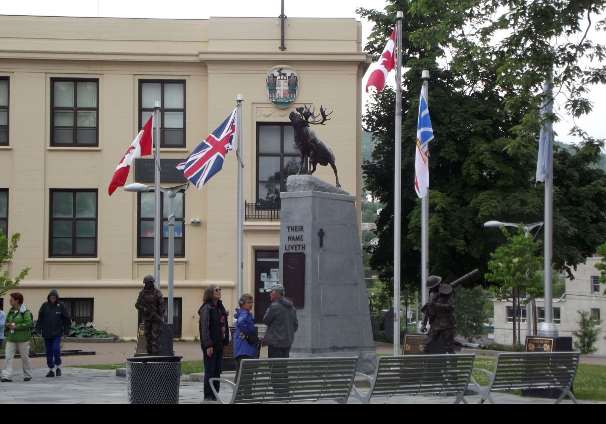 The Caribou Monument dedicated to the men of western Newfoundland who died in War.  Situated in Remembrance Square (City Hall Plaza) at the junction of Main Street & West Street, the bronze statue was erected in June 2012.  Morgan MacDonald sculpted the piece.