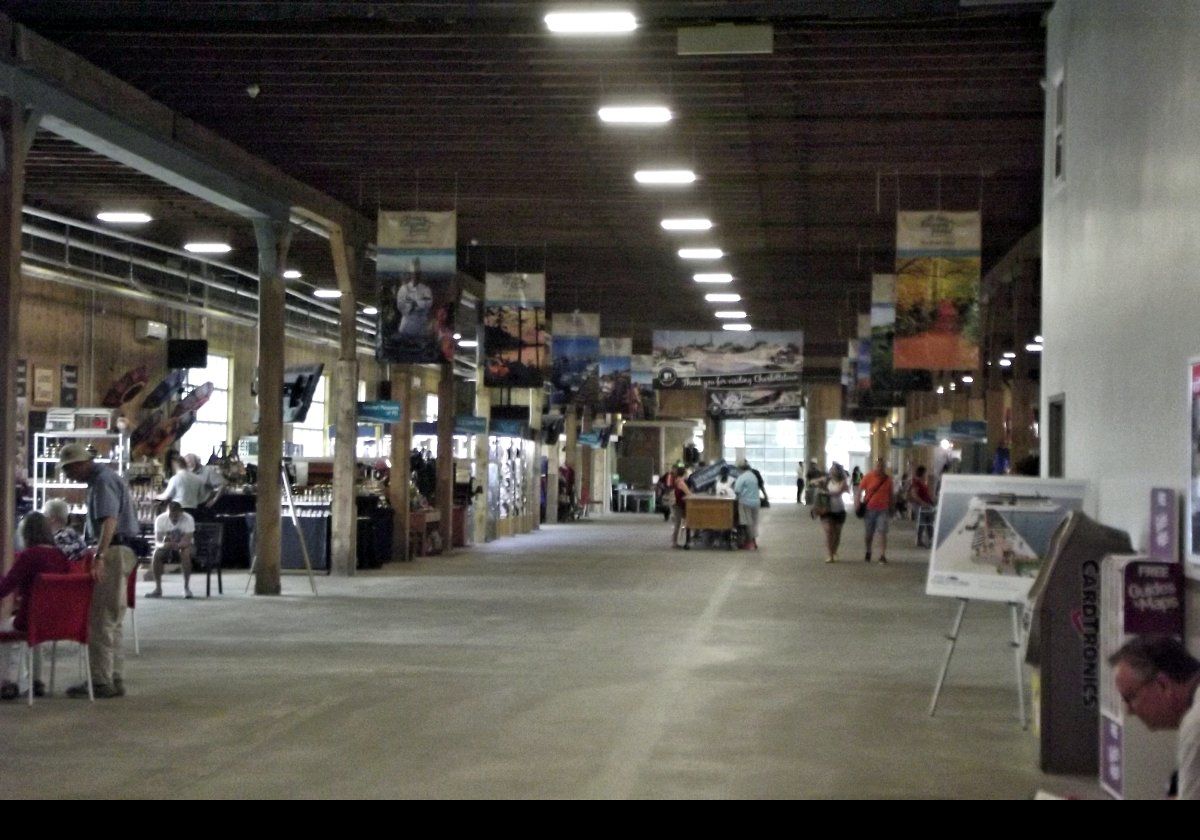 Various retail outlets setup in the hall of the arrivals building at the dock.