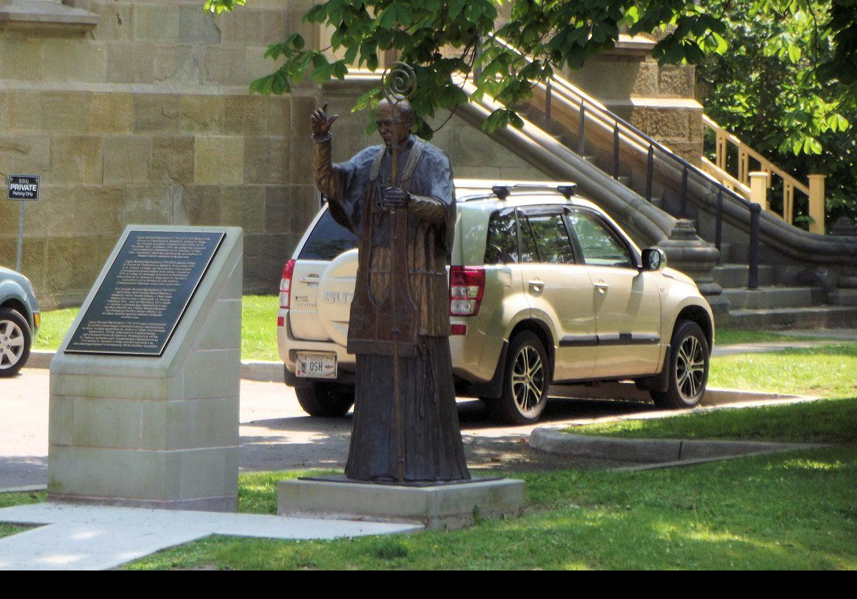 A bronze statue of Bishop Angus MacEachern, Charlottetown’s first bishop.  Originally from Scotland, he arrived on Prince Edward Island in August of 1790, and worked here for 45 years.