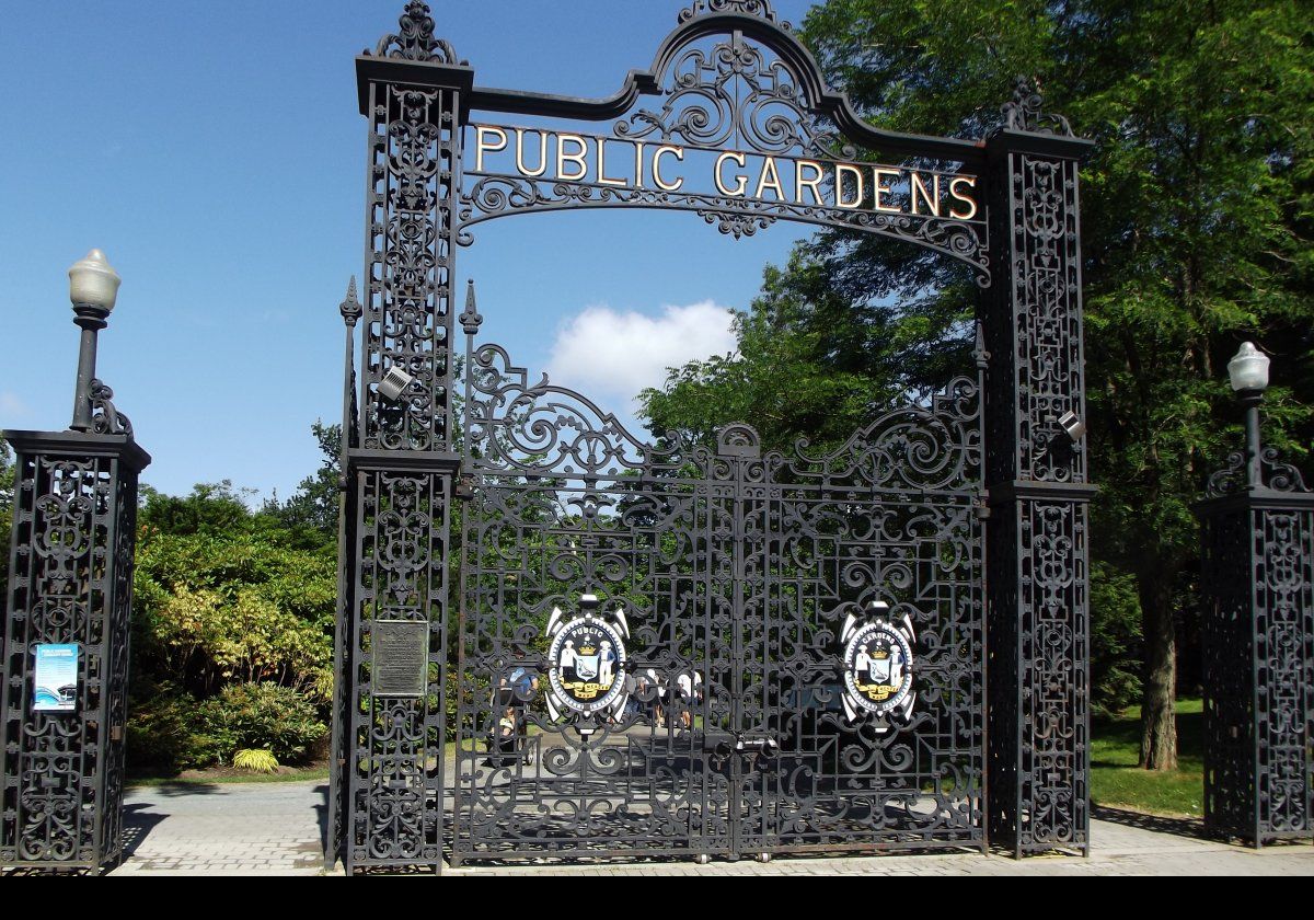 The wrought iron gates were purchased in 1890 from the Saracen Foundary in Scotland.  Originally installed on the Arched Pavilion, that was the main entrance to the park, about 150 mts/yds north of their current location.  They were moved to their present location on the southeast corner of the Gardens in 1907.  