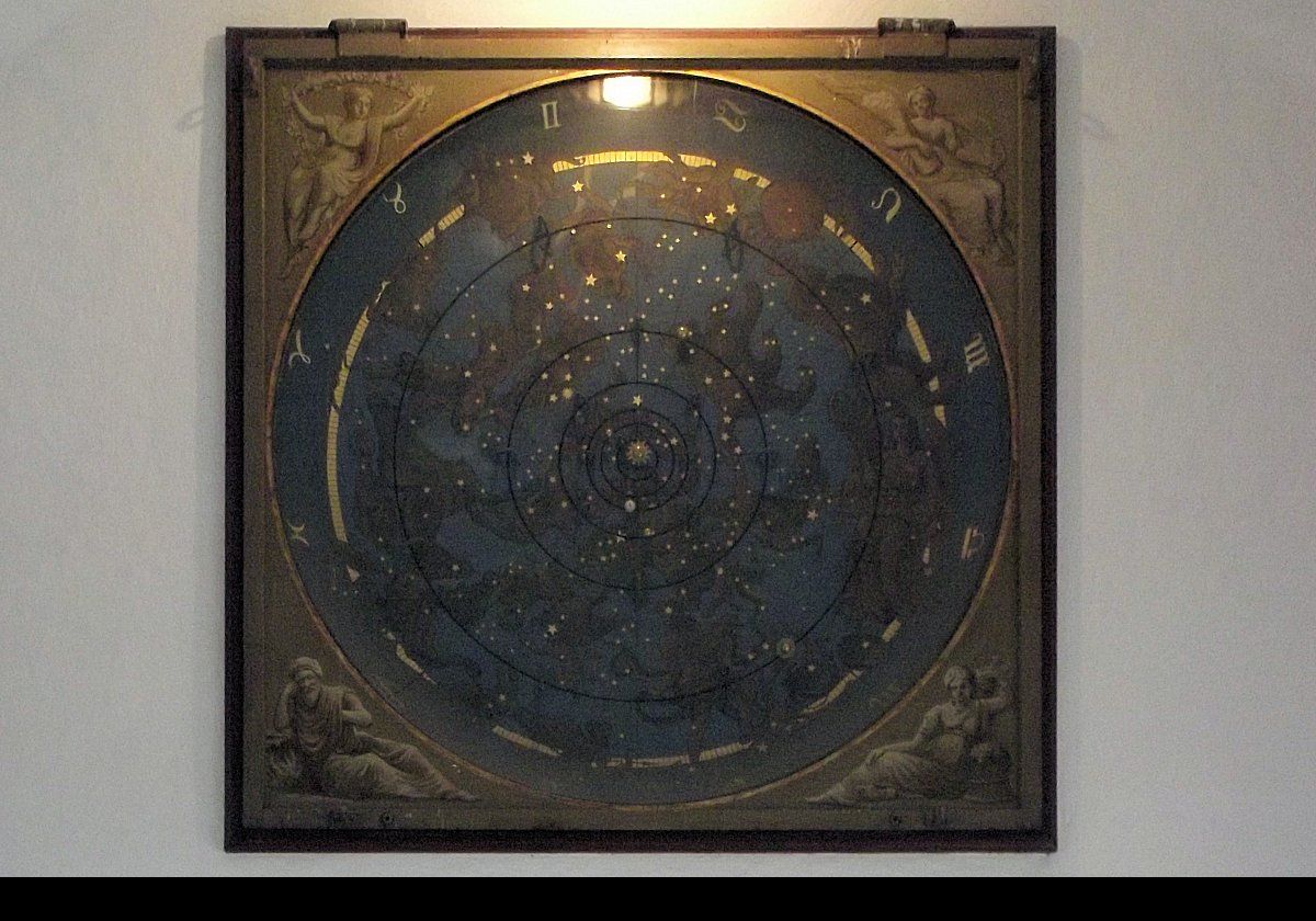 The "Planet Machine" by Ole Rømer around 1675.  It was used to teach astronomy.  
