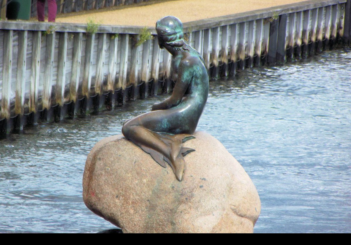The Little Mermaid, or "Den lille havfrue" in Danish, is a bronze statue by Edvard Eriksen, depicting a mermaid. The sculpture found at the water's edge along the Langelinie promenade.  It was much smaller than I expected.  Interestingly, it is thought that this statue has always been a replica, since its completion in 1913, while the original is owned by the sculptor's (Edvard Erikse) family.  