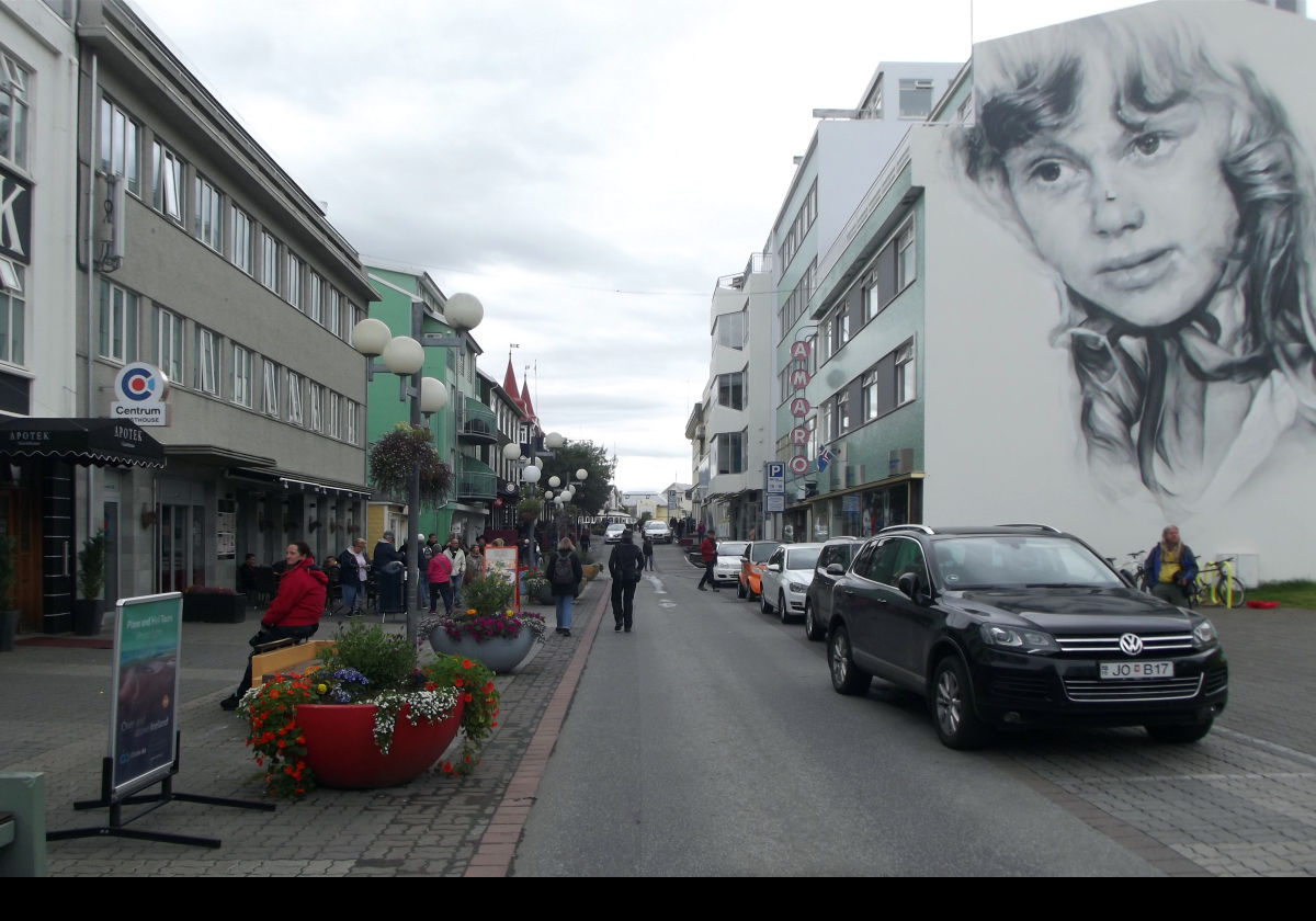 A mural created by Guido Van Helten for the Akureyrarvaka culture festival in 2014.  The image is portrait of a local actress known as Sia, when she was young.  She died in 2010 in Akureyri. 