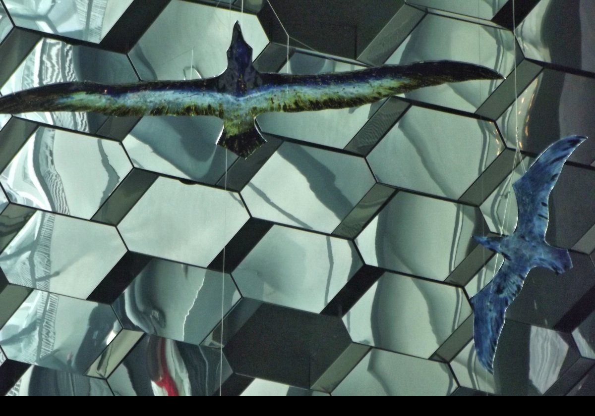 These large glass birds hanging from the roof of Harpa were sculpted by Tróndur Patursson.