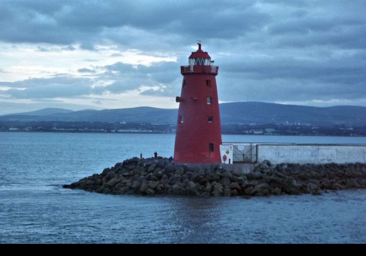 Poolbeg Lighthouse in Dublin Bay.  Built in 1768, it used candles until 1786 when it was converted to oil.  The present lighthouse dates from 1820.