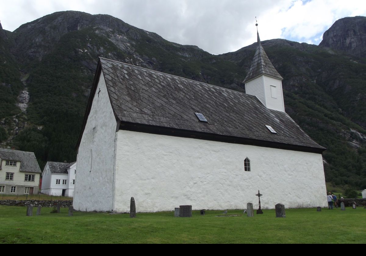 The north wall of the Lutheran Old Eidfjord Church (Eidfjord gamle kyrkje) on the outskirts of Eidfjord.  Built around 1309, it was in regular use up until 1981 when the new Church was built.  