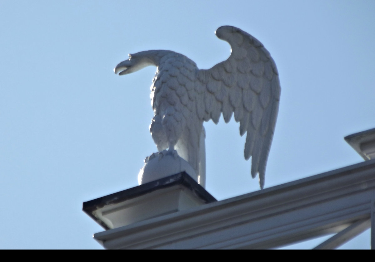 The four eagles were carved by sailors on board the “Yankee” during the War of 1812 and given to Benjamin Churchill, who was their Captain.  He had purchased the house in 1822. 
