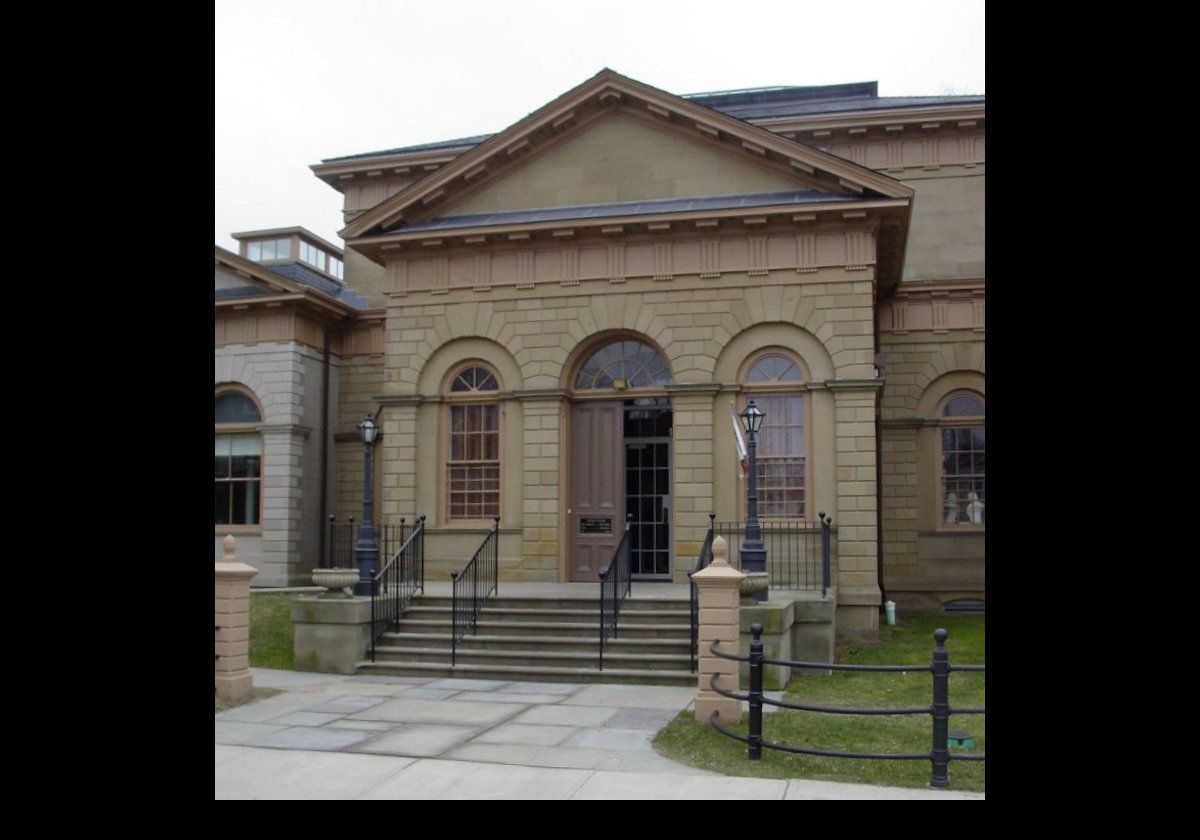 The Redwood Library and Athenaeum is a private subscription library located at number 50 Bellevue Avenue.  It was founded in 1747, and is the oldest library in its original building in the USA.  