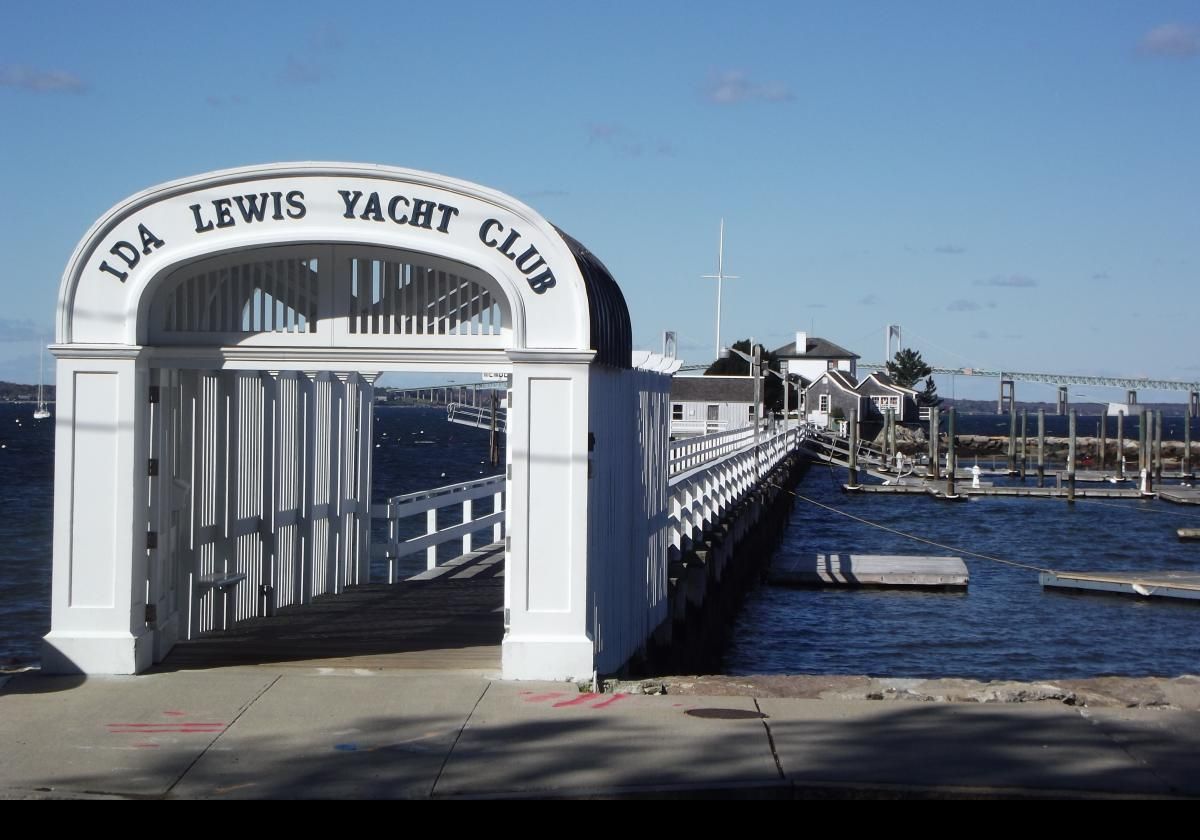 These pictures show the Ida Lewis Yatch Club which is named for a famous Newport lighthouse keeper who was often called the "bravest Woman in America" for her amazing rescues.  The Lime Rock lighthouse was re-named the Ida Lewis Light in her honor.  The lighthouse is now the clubhouse of the yatch club, and is seen at the end of the pier.