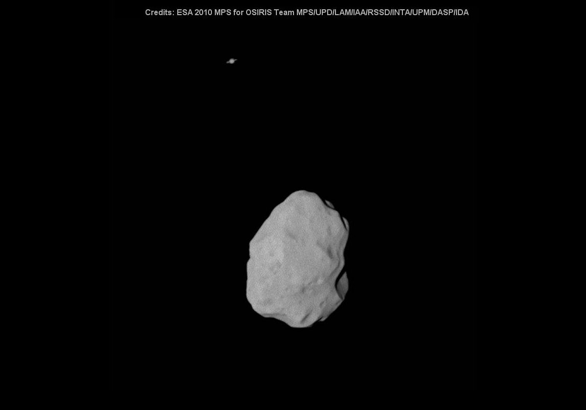 Another Rosetta spacecraft image of asteroid 21 Lutetia from a distance of 32,000 km (25,000 miles) with Saturn in the background. 