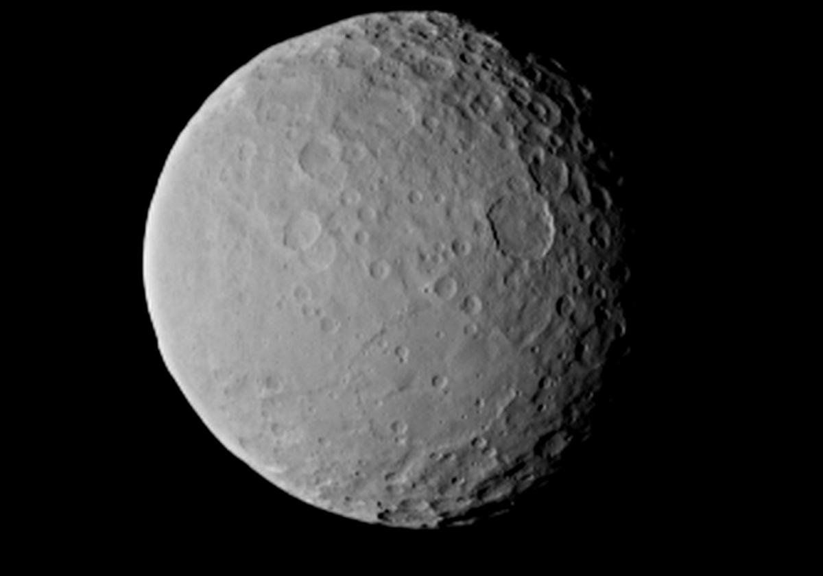 The first of two images of Ceres taken by the Dawn spacecraft in 2015.  Click the image to see a possible cross section of Ceres.  