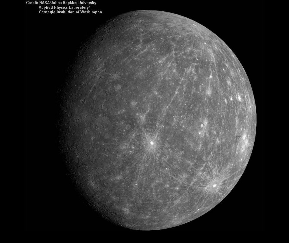 Second of two images from the Messenger probe taken in 2008, during a fly-by of Mercury, showing the two faces of the planet. The Kuiper crater (60km across) is just below the center in this image.    