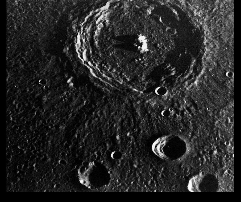 The large Brahms Crater which is about 75 km (47 miles) in diameter.  You can see the peak at the center.  Taken by Mariner 10