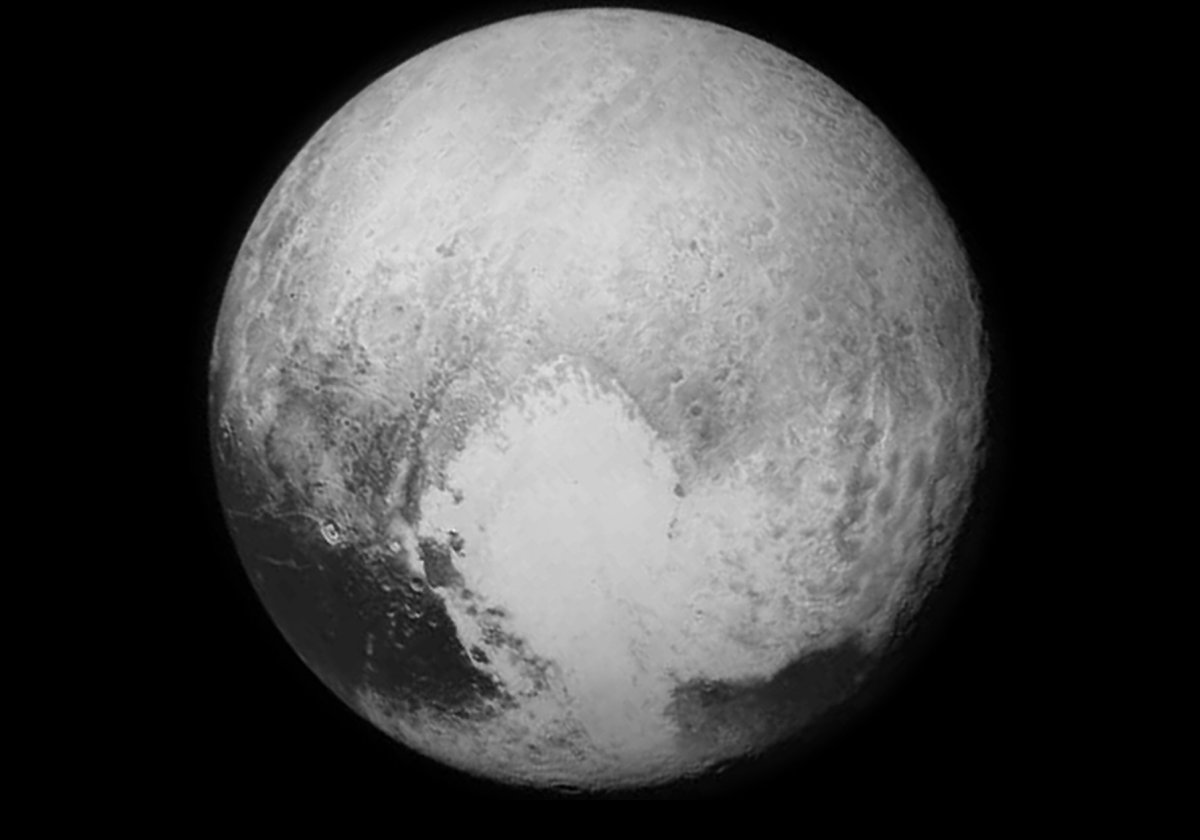 Picture showing Pluto's "Big Heart" in the lower right.  Official name is Sputnik Planum.