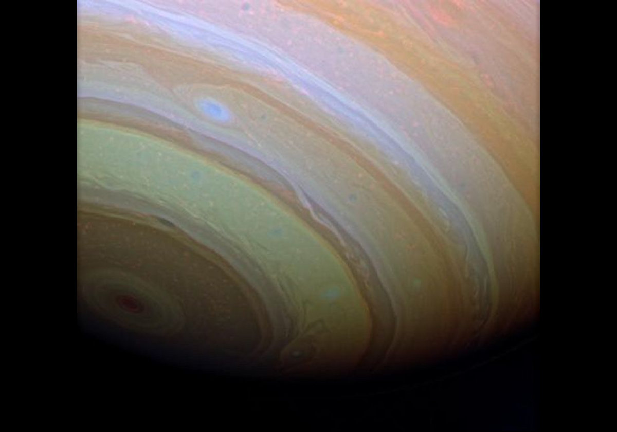 This image has been enhanced, and appears in false color to exaggerate the details seen in the atmosphere of Saturn's southern hemisphere.  Taken by the Cassini spacecraft from a distance of approximately 1 million kilometers (600,000 miles) from Saturn.  