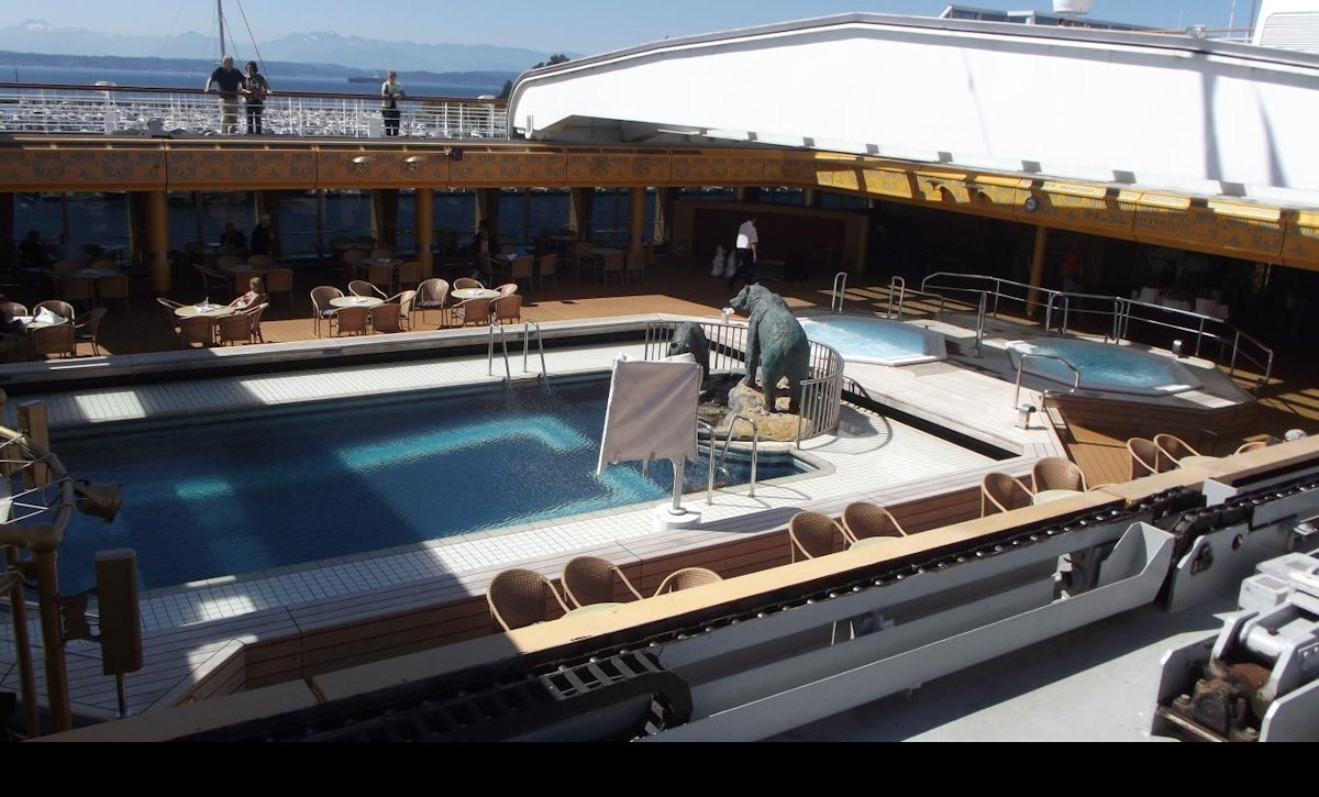 A pool and hot tubs on the ship.