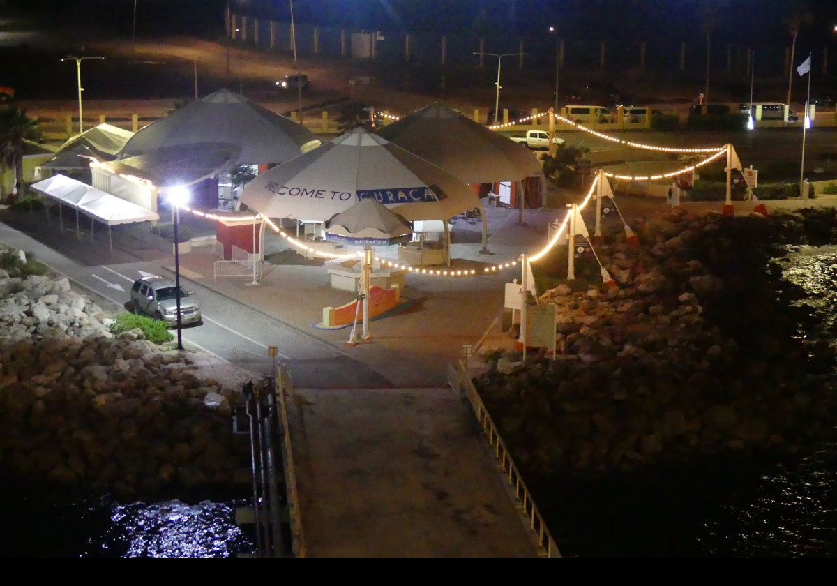 The dockside welcome area at night.
